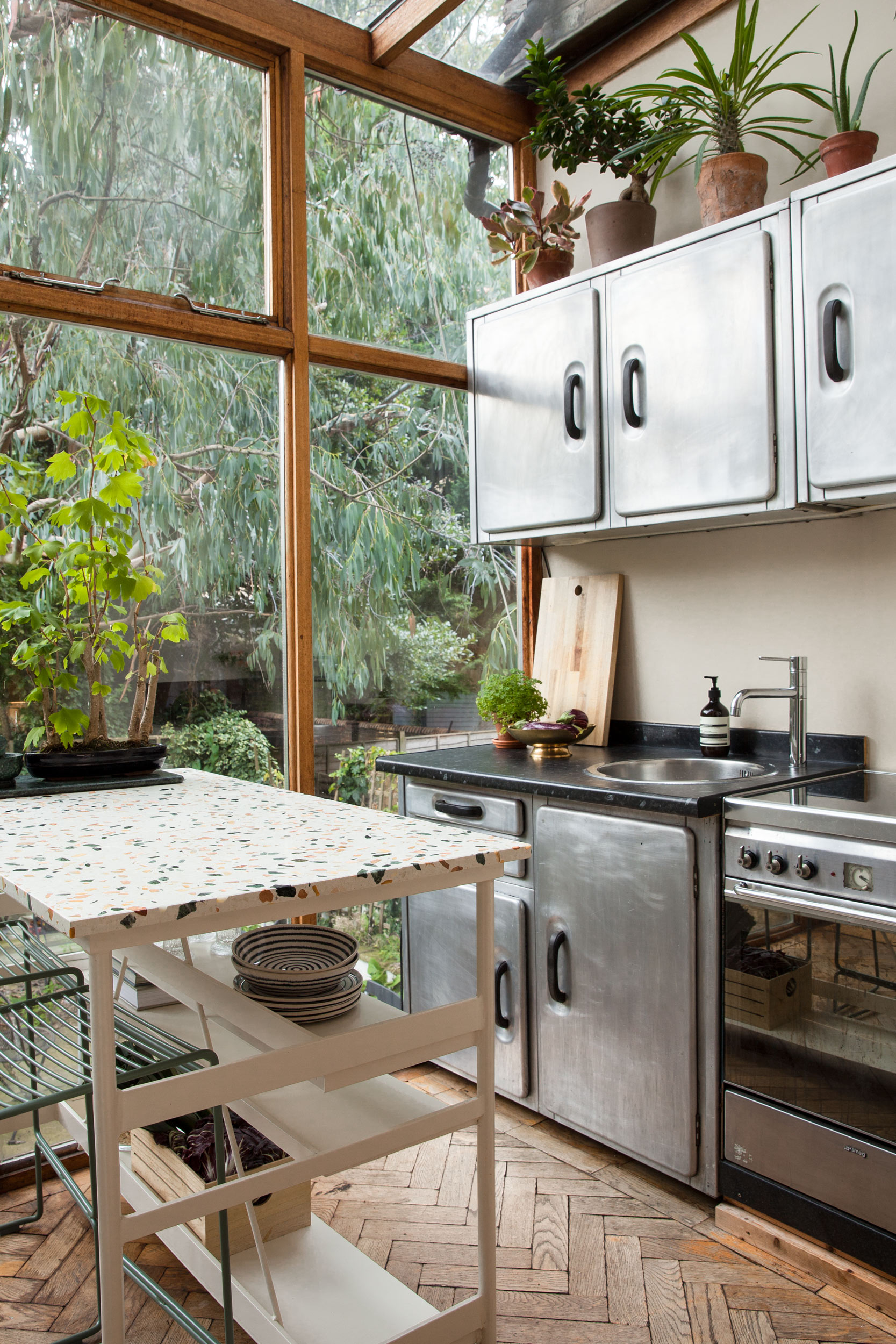 Kitchen cabinetry and terrazzo dining table